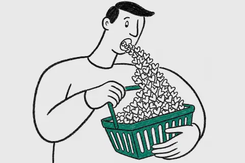 waist-up view of a man with a short side parting pouring an endless river of tiny paper hearts out of his open mouth into a shopping basket; astonished
