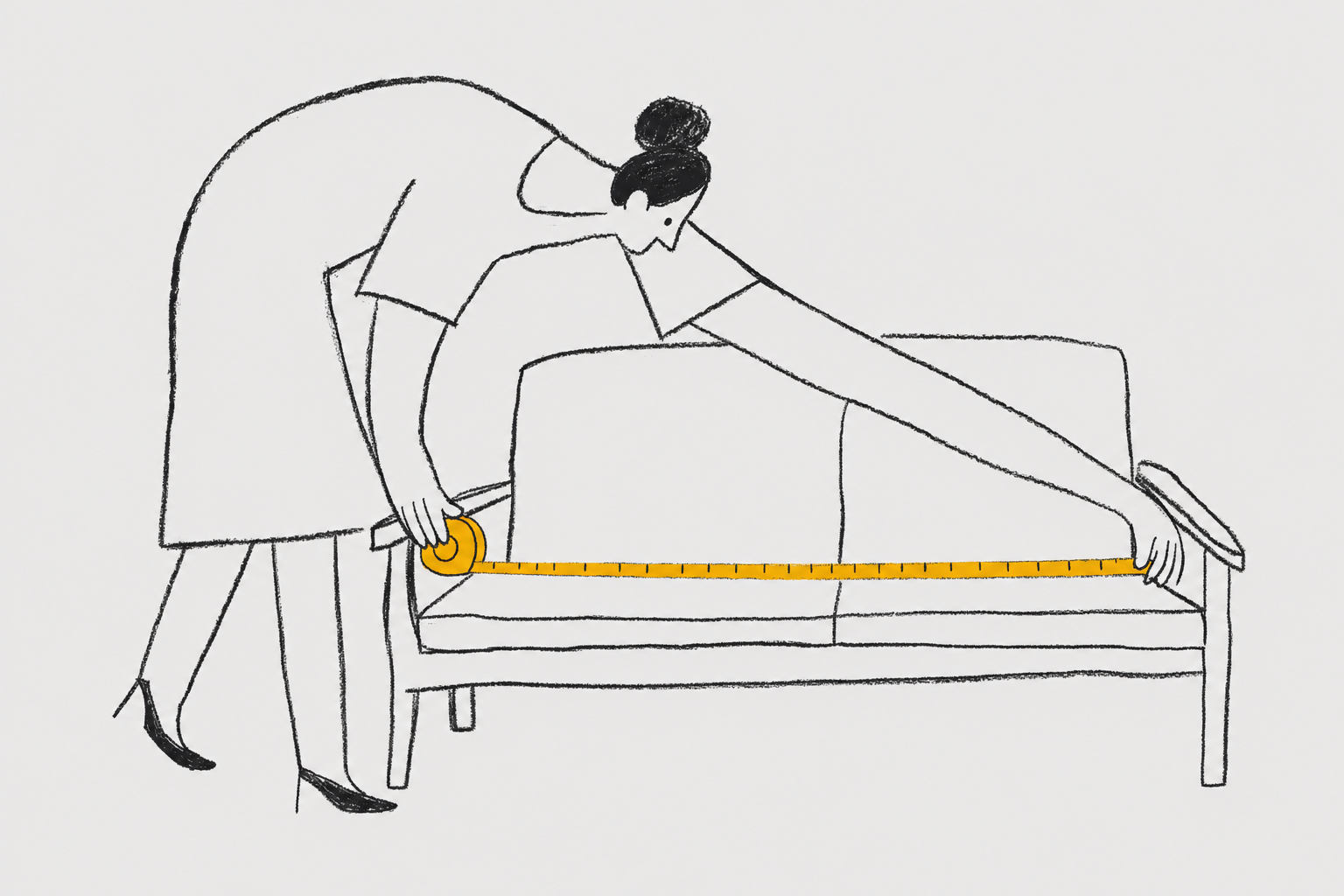woman measuring wooden sofa