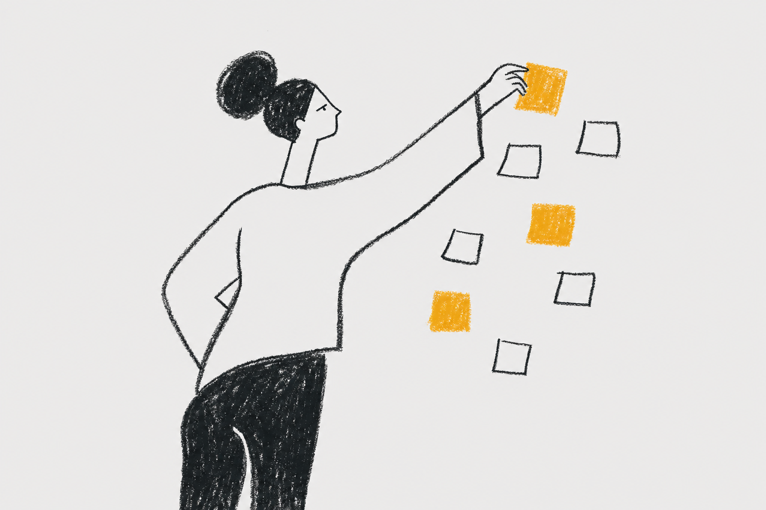 woman mapping sticky notes on wall