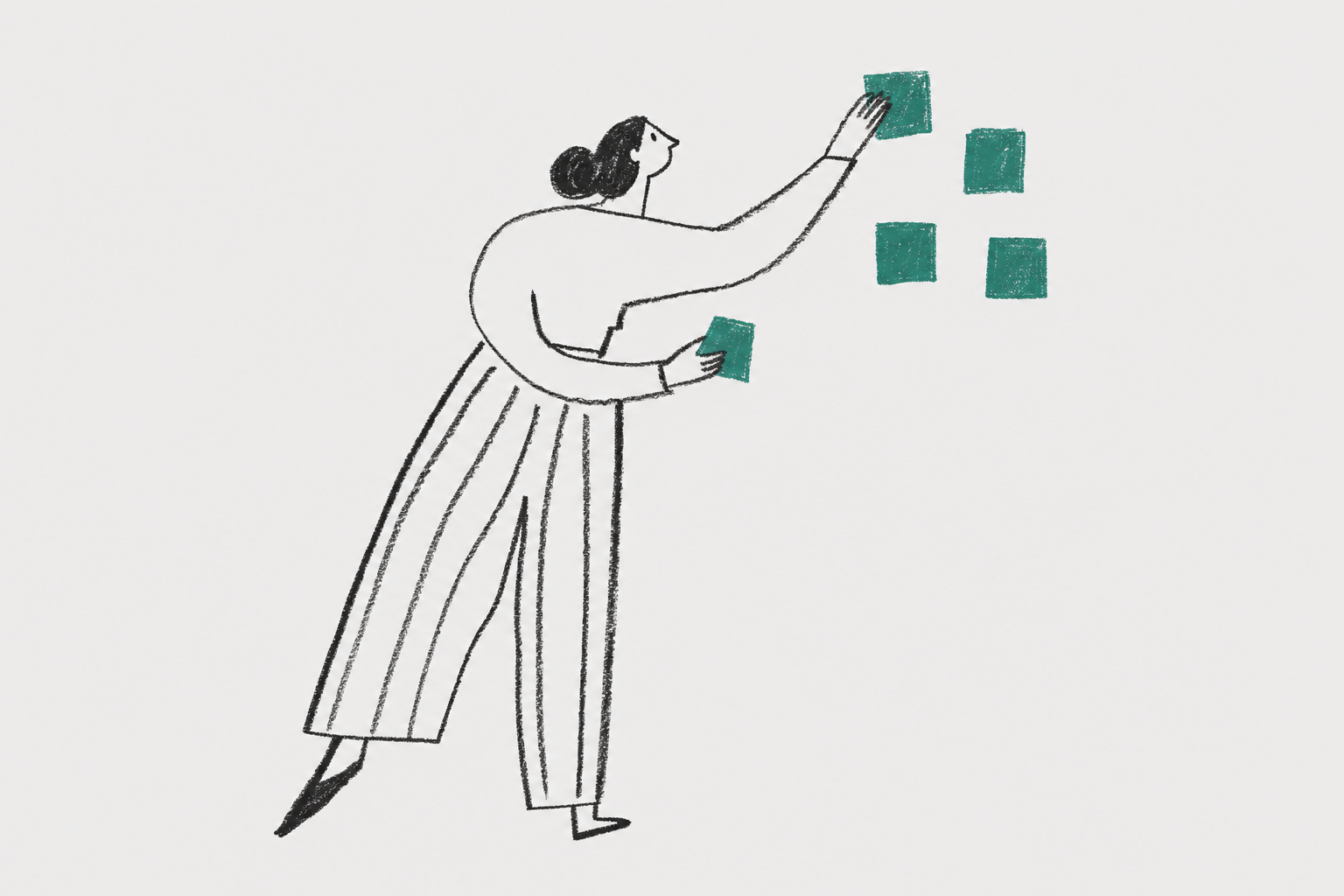 woman posting sticky notes on wall