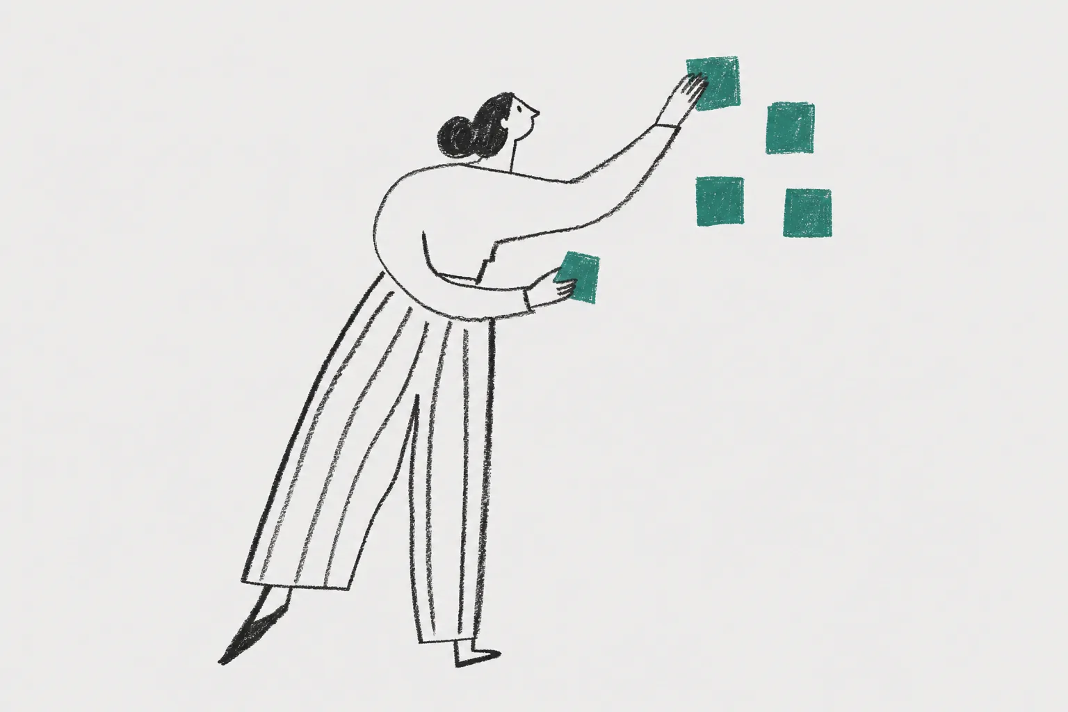 woman posting sticky notes on wall