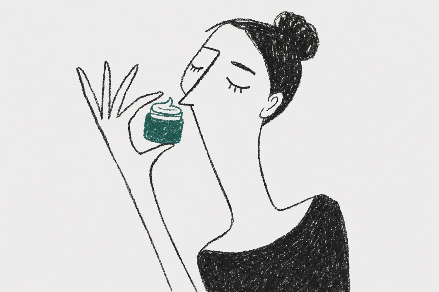woman smelling face cream