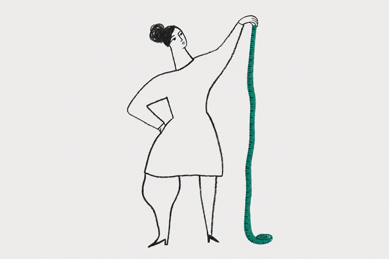 woman holding single measuring tape