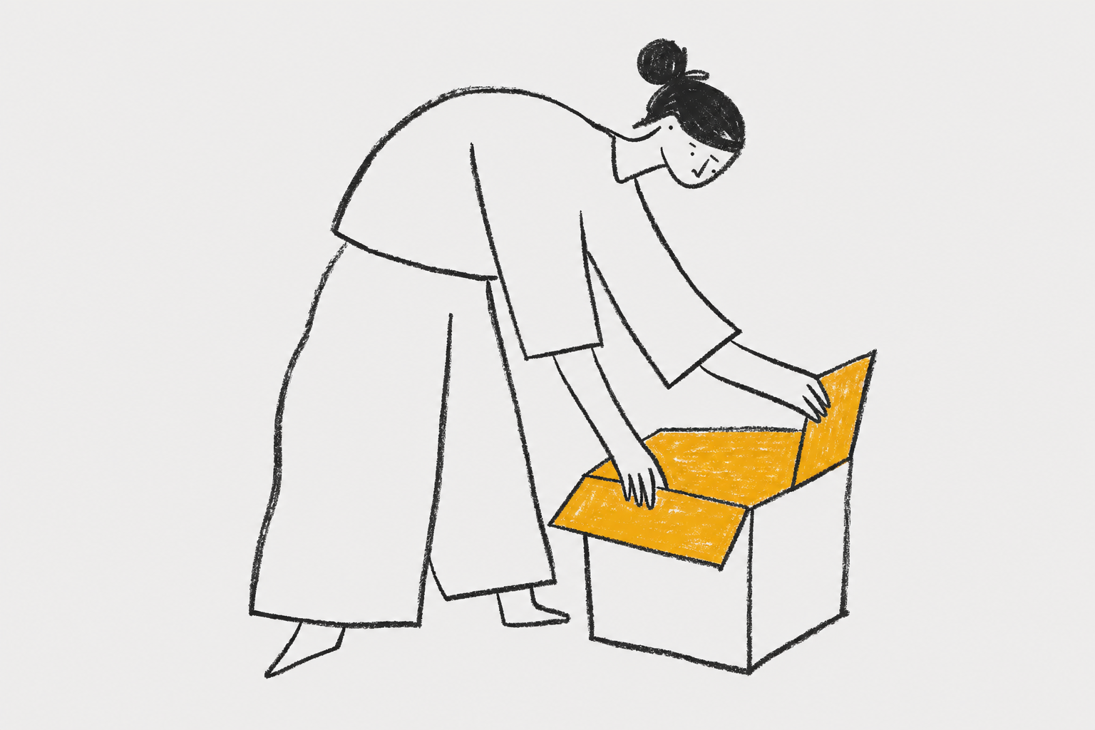 woman opening cardboard box