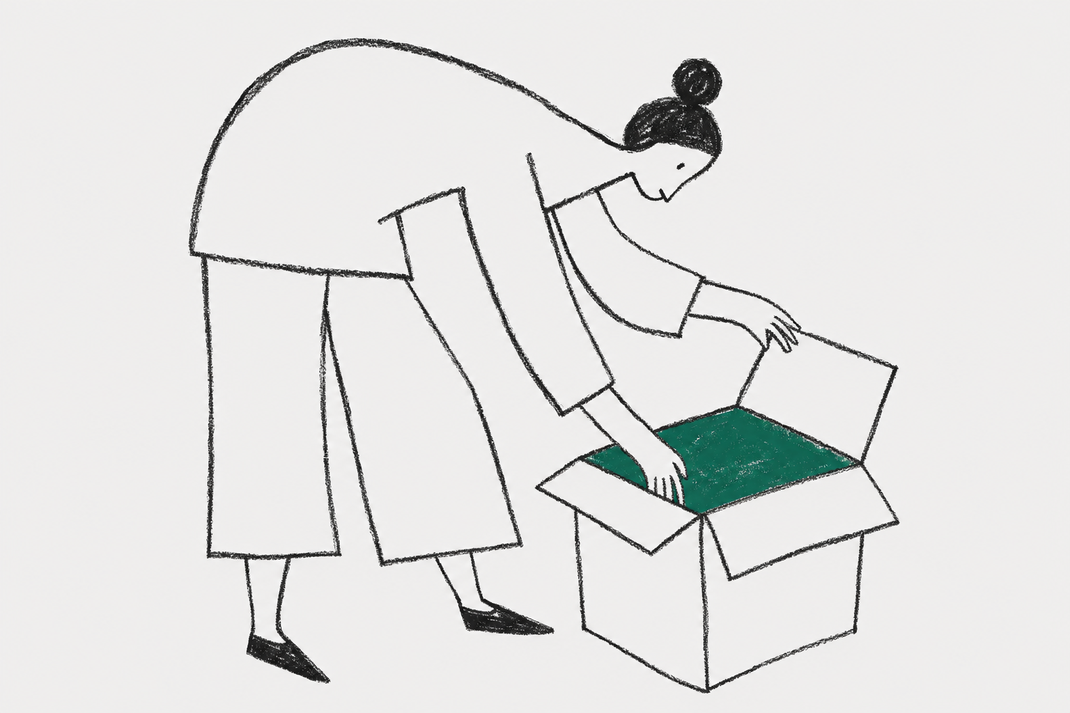 woman opening cardboard box